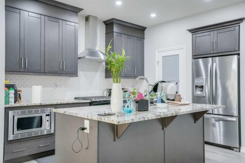 673 Corner Meadows Way Ne, Calgary, AB - Indoor Photo Showing Kitchen With Stainless Steel Kitchen With Upgraded Kitchen