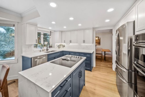 76 Stradbrooke Way Sw, Calgary, AB - Indoor Photo Showing Kitchen With Upgraded Kitchen