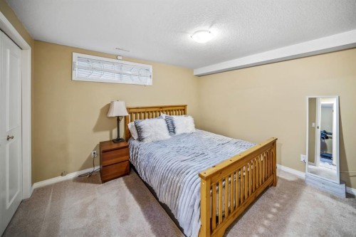 76 Stradbrooke Way Sw, Calgary, AB - Indoor Photo Showing Bedroom