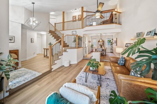 76 Stradbrooke Way Sw, Calgary, AB - Indoor Photo Showing Living Room
