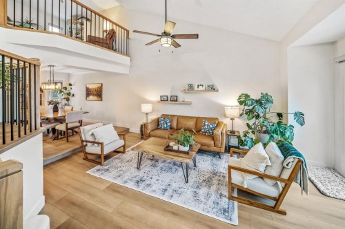 76 Stradbrooke Way Sw, Calgary, AB - Indoor Photo Showing Living Room
