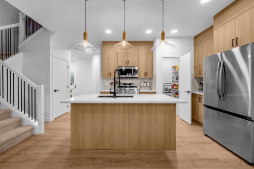 288 Sora Terrace Se, Calgary, AB - Indoor Photo Showing Kitchen With Upgraded Kitchen