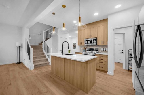 288 Sora Terrace Se, Calgary, AB - Indoor Photo Showing Kitchen With Upgraded Kitchen