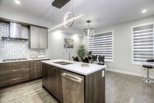 1545 33 Avenue Sw, Calgary, AB - Indoor Photo Showing Kitchen With Double Sink With Upgraded Kitchen