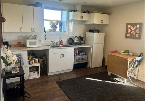30480 #16 Range Road 12, Rural Mountain View County, AB - Indoor Photo Showing Kitchen With Double Sink
