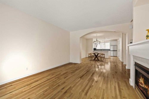 2964 Peacekeepers Way Sw, Calgary, AB - Indoor With Fireplace