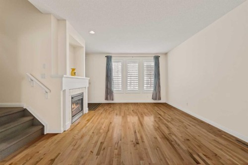 2964 Peacekeepers Way Sw, Calgary, AB - Indoor With Fireplace