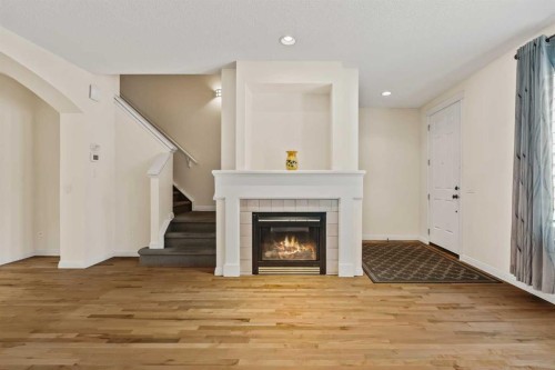 2964 Peacekeepers Way Sw, Calgary, AB - Indoor With Fireplace