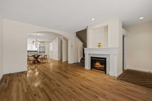 2964 Peacekeepers Way Sw, Calgary, AB - Indoor Photo Showing Living Room With Fireplace