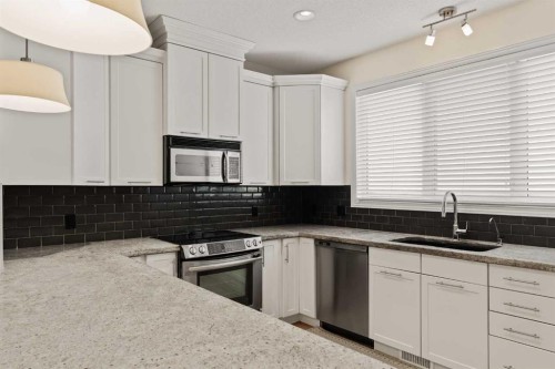 2964 Peacekeepers Way Sw, Calgary, AB - Indoor Photo Showing Kitchen With Upgraded Kitchen
