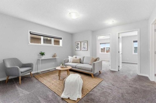 730 Redstone Drive Ne, Calgary, AB - Indoor Photo Showing Living Room