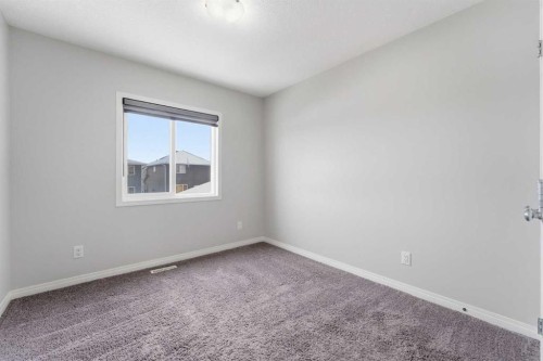 730 Redstone Drive Ne, Calgary, AB - Indoor Photo Showing Other Room