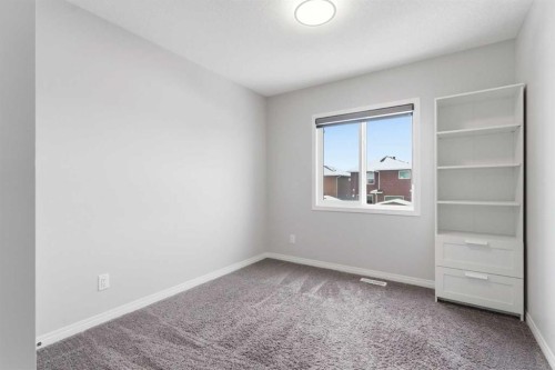 730 Redstone Drive Ne, Calgary, AB - Indoor Photo Showing Other Room