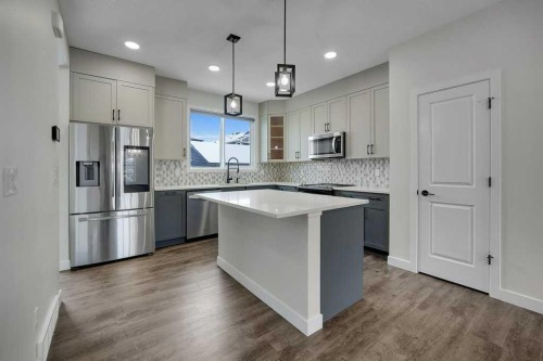 103 Highview Gate Se, Airdrie, AB - Indoor Photo Showing Kitchen With Upgraded Kitchen