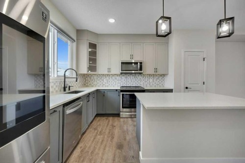 103 Highview Gate Se, Airdrie, AB - Indoor Photo Showing Kitchen With Upgraded Kitchen