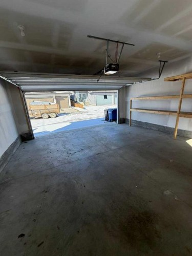 103 Highview Gate Se, Airdrie, AB - Indoor Photo Showing Garage