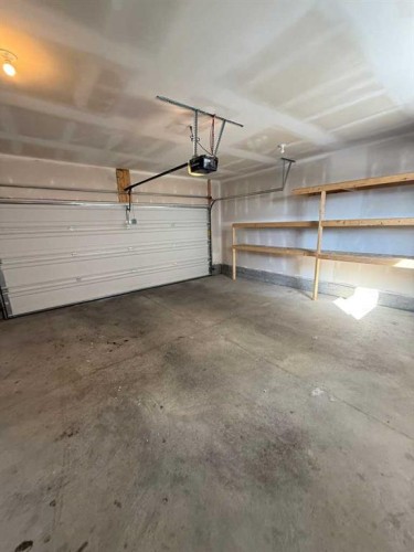 103 Highview Gate Se, Airdrie, AB - Indoor Photo Showing Garage