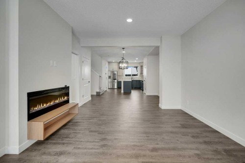 103 Highview Gate Se, Airdrie, AB - Indoor Photo Showing Living Room With Fireplace