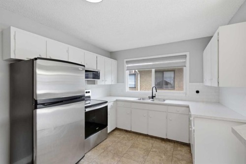 6131 Bowness Road Nw, Calgary, AB - Indoor Photo Showing Kitchen