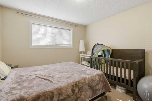 6131 Bowness Road Nw, Calgary, AB - Indoor Photo Showing Bedroom