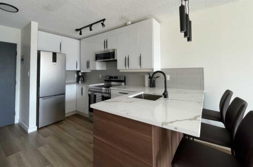 703-340 14 Avenue SW Calgary, AB T2R 0M4