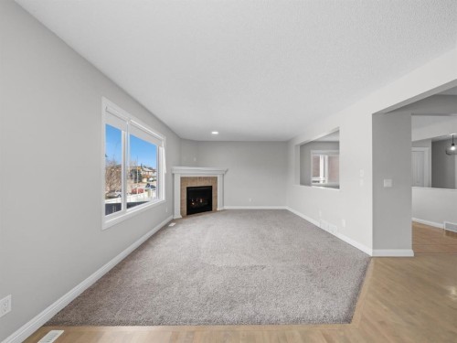 40 Everwillow Park Sw, Calgary, AB - Indoor With Fireplace