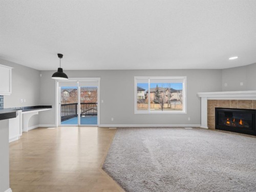 40 Everwillow Park Sw, Calgary, AB - Indoor Photo Showing Living Room With Fireplace