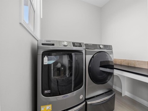 40 Everwillow Park Sw, Calgary, AB - Indoor Photo Showing Laundry Room
