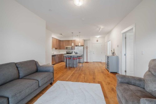 1216-215 Legacy Boulevard Se, Calgary, AB - Indoor Photo Showing Living Room