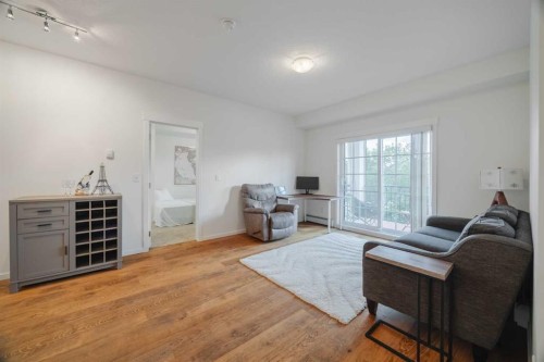 1216-215 Legacy Boulevard Se, Calgary, AB - Indoor Photo Showing Living Room