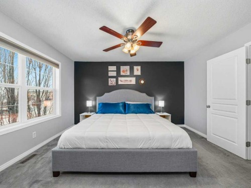 115 Canals Circle Sw, Airdrie, AB - Indoor Photo Showing Bedroom