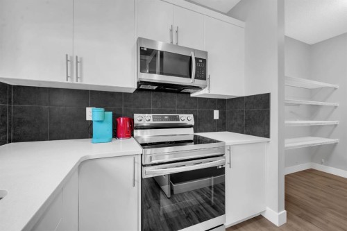 155 Carringham Way Nw, Calgary, AB - Indoor Photo Showing Kitchen