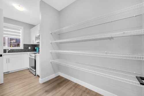 155 Carringham Way Nw, Calgary, AB - Indoor With Storage