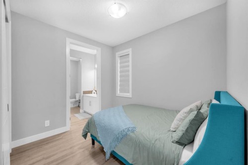 155 Carringham Way Nw, Calgary, AB - Indoor Photo Showing Bedroom