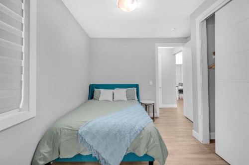 155 Carringham Way Nw, Calgary, AB - Indoor Photo Showing Bedroom