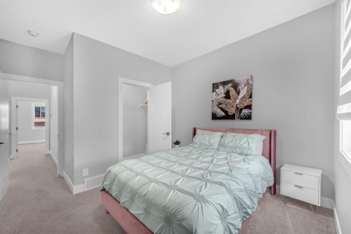 155 Carringham Way Nw, Calgary, AB - Indoor Photo Showing Bedroom