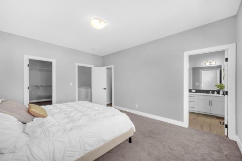 155 Carringham Way Nw, Calgary, AB - Indoor Photo Showing Bedroom