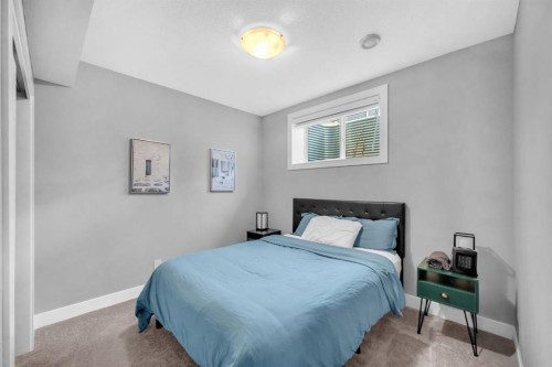 155 Carringham Way Nw, Calgary, AB - Indoor Photo Showing Bedroom