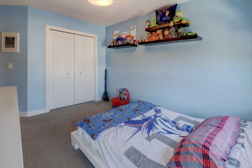 38 Cranbrook Place Se, Calgary, AB - Indoor Photo Showing Bedroom