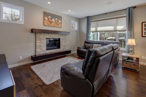 38 Cranbrook Place Se, Calgary, AB - Indoor Photo Showing Living Room With Fireplace