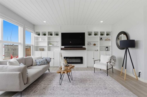 55 Marquis Green Se, Calgary, AB - Indoor Photo Showing Living Room With Fireplace