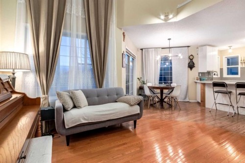 27 Arbour Butte Road Nw, Calgary, AB - Indoor Photo Showing Living Room