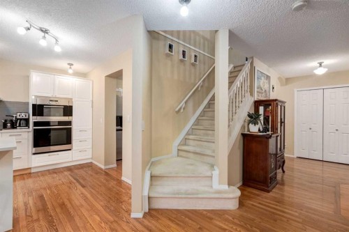 27 Arbour Butte Road Nw, Calgary, AB - Indoor Photo Showing Kitchen