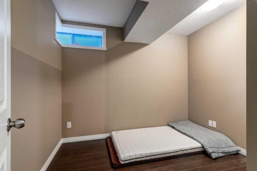 27 Arbour Butte Road Nw, Calgary, AB - Indoor Photo Showing Bedroom