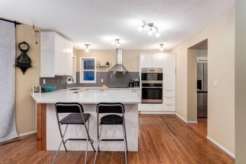 27 Arbour Butte Road Nw, Calgary, AB - Indoor Photo Showing Kitchen With Upgraded Kitchen