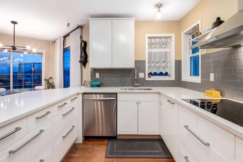 27 Arbour Butte Road Nw, Calgary, AB - Indoor Photo Showing Kitchen With Upgraded Kitchen