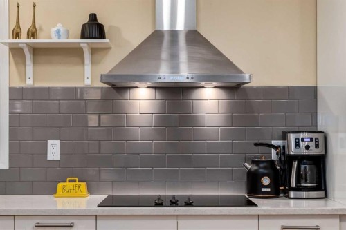 27 Arbour Butte Road Nw, Calgary, AB - Indoor Photo Showing Kitchen