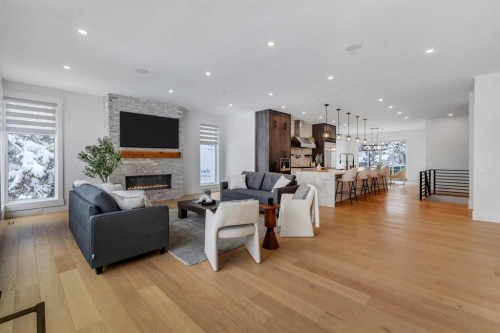 30 Roselawn Crescent Nw, Calgary, AB - Indoor Photo Showing Living Room With Fireplace