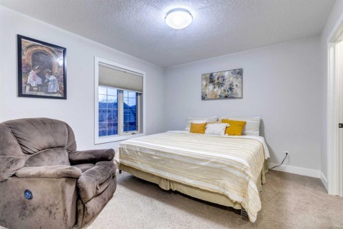 61 Masters Landing Se, Calgary, AB - Indoor Photo Showing Bedroom