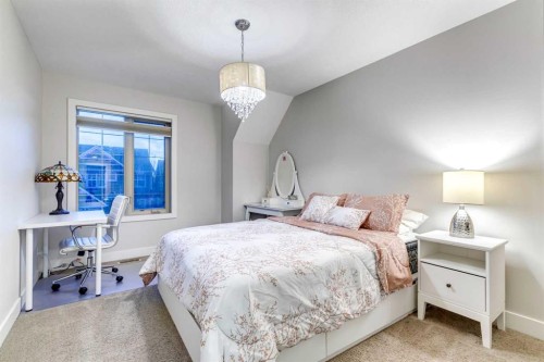 61 Masters Landing Se, Calgary, AB - Indoor Photo Showing Bedroom